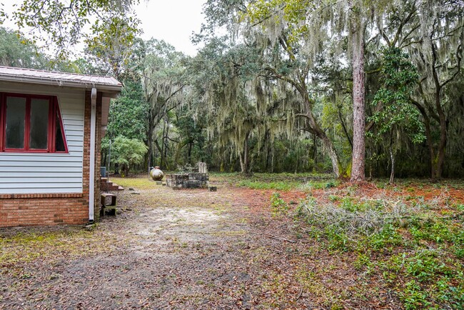 Building Photo - Tucked Away Three Bedroom Home