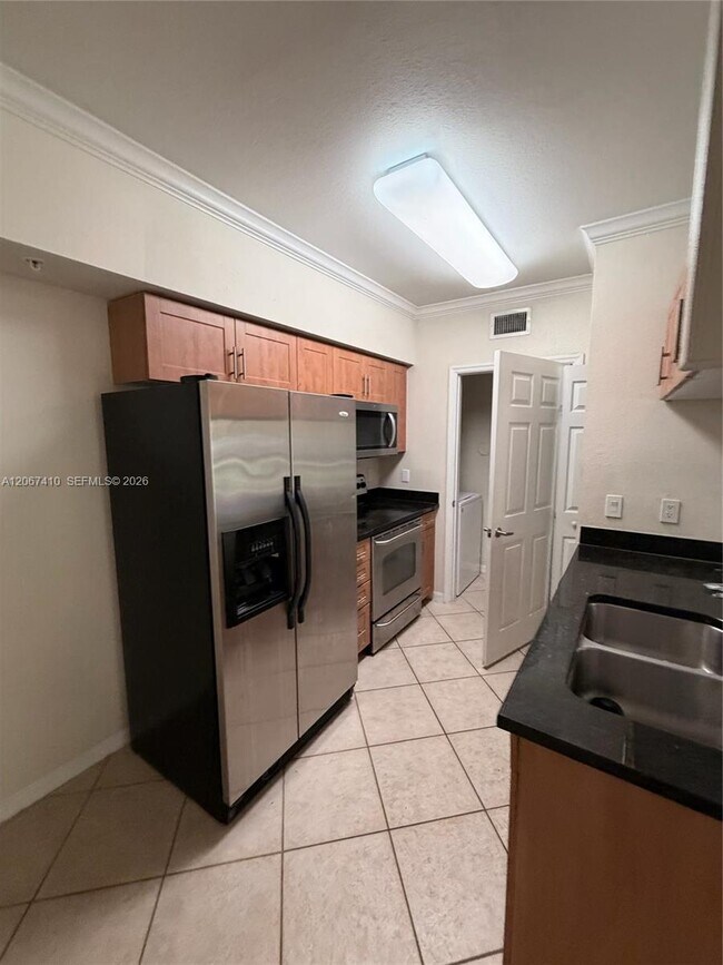 Building Photo - 6492 Emerald Dunes Dr