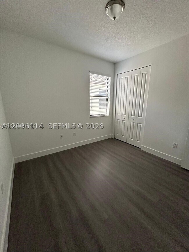Building Photo - 9883 W 34th Ln