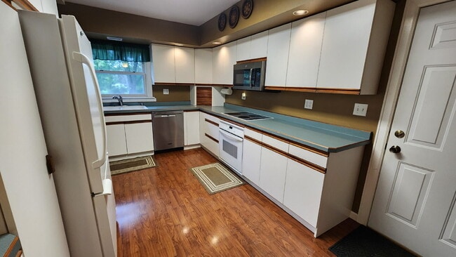 Building Photo - Spacious 4-Bedroom Home with Bonus Room, 3-Season Porch & Private Backyard