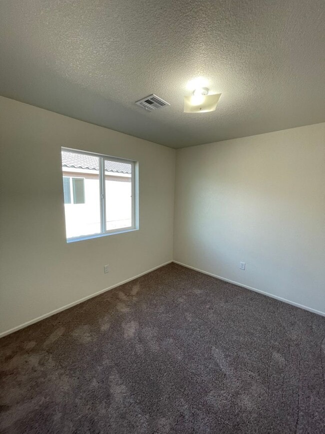 Building Photo - NEARLY NEW Home in the Desired Desert Sands Subdivision!