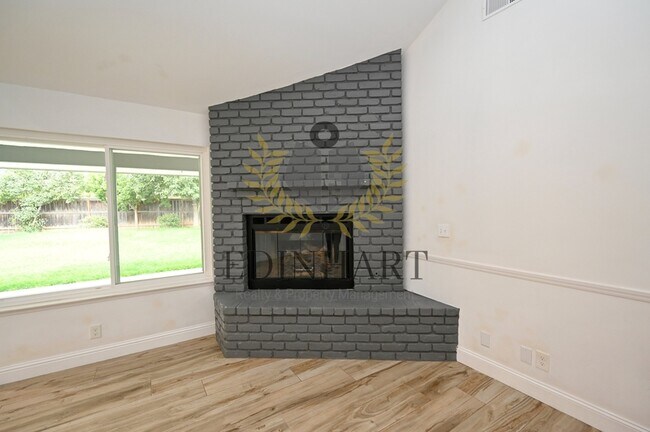 Building Photo - 7721 N Cedar Ave