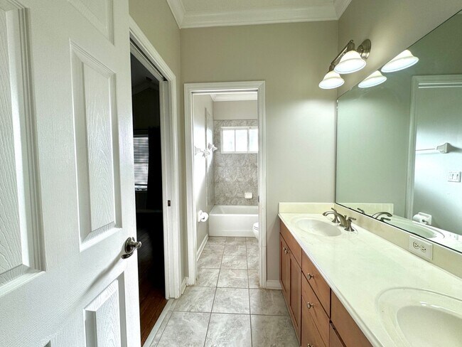 Building Photo - Coastal Charm: Luxurious 4-Bedroom Home in Gated Community Near the Intracoastal