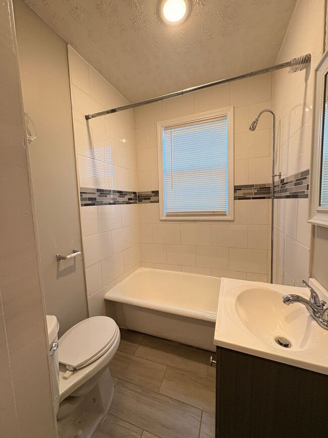 Building Photo - Live in Style without Breaking the Bank at Magnolias Living Apartments Washer & dryer in-unit