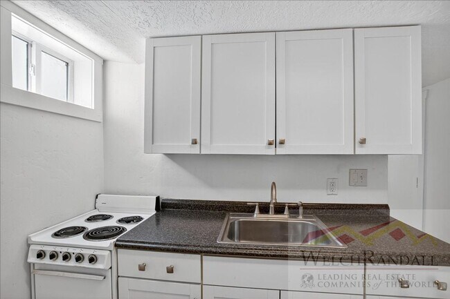 Building Photo - Javid Properties Triplex