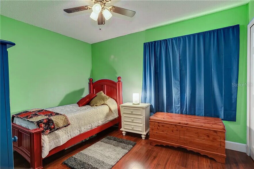 Bedroom (not furnished; furniture shown as an example layout only) - 3718 Powers Ridge Ct