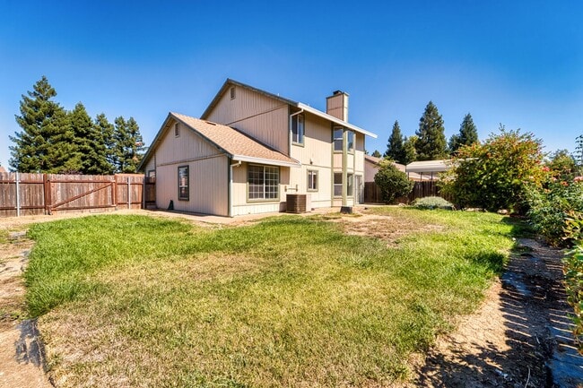 Building Photo - Spacious 4-Bedroom Home Near Happy Park