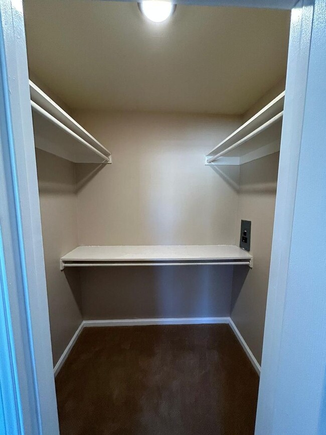 Building Photo - 2 Bedroom 1.5 Bath Townhome. Gated Community. Upgraded & 2 Parking Spaces