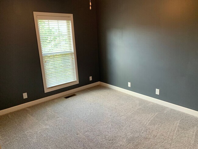 Building Photo - Luxury Living! Beautiful Brick Home in Sango with 3 car garage.
