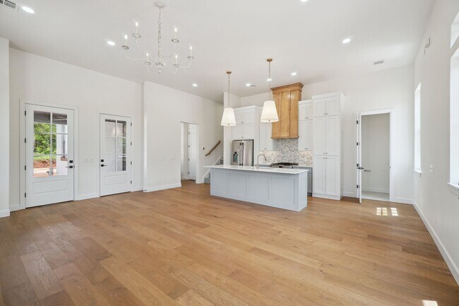 Building Photo - Classic Cape Cod Meets Modern Glam: Your D...