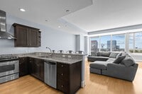 Building Photo - Modern 1-Bedroom with Downtown Raleigh Skyline Views