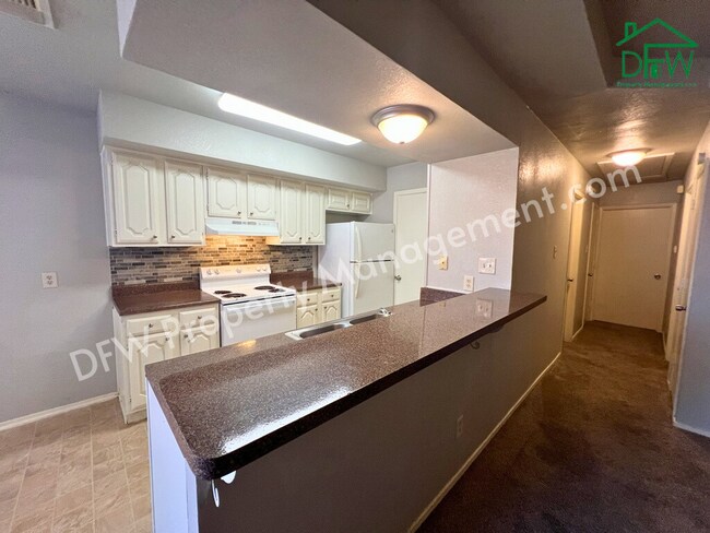 Building Photo - Charming Single-Story 2/2 Duplex with 2-Car Garage Just Steps from Your Back Door – Arlington, TX