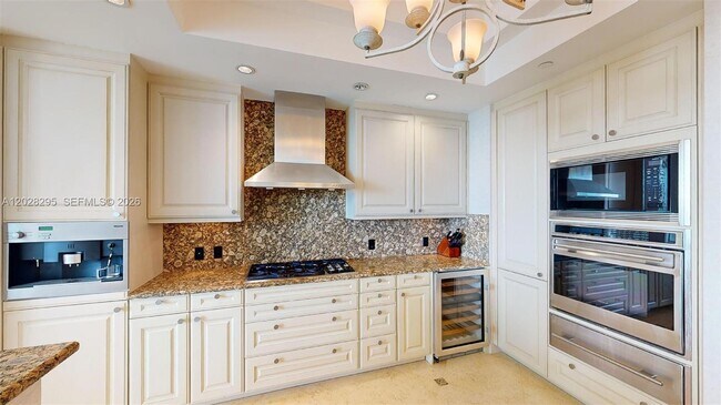 Building Photo - 10295 Collins Ave