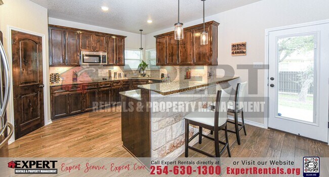 Building Photo - Elegant Corner-Lot Retreat with Upgraded F...