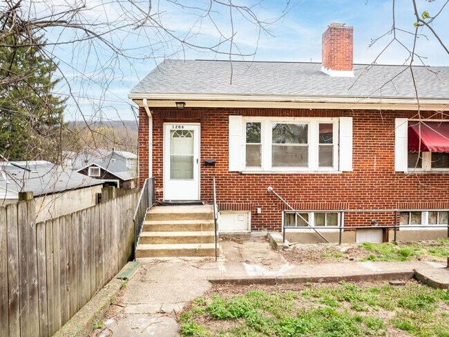 Building Photo - 1206-1206 5th Ave