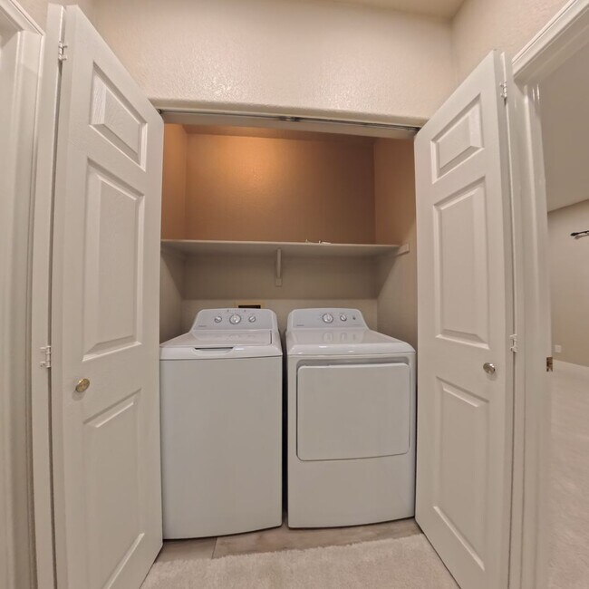 Building Photo - Beautifully Renovated 2nd-Floor Condo in Prime Location