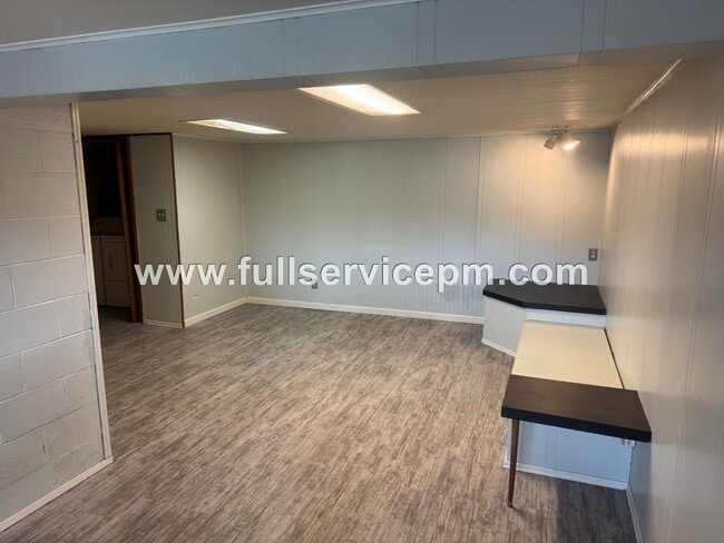 Building Photo - Lower basement studio unit in a house