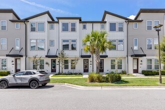 Building Photo - Upgraded 3BR/3.5BA Laureate Park Townhome | 2-Car Garage + EV Charging