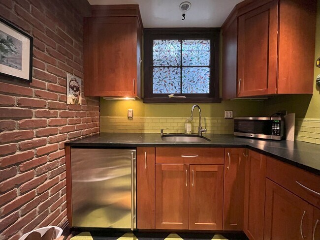 Building Photo - Charming NW Portland 1-Bedroom with Brick Accents & Modern Touches