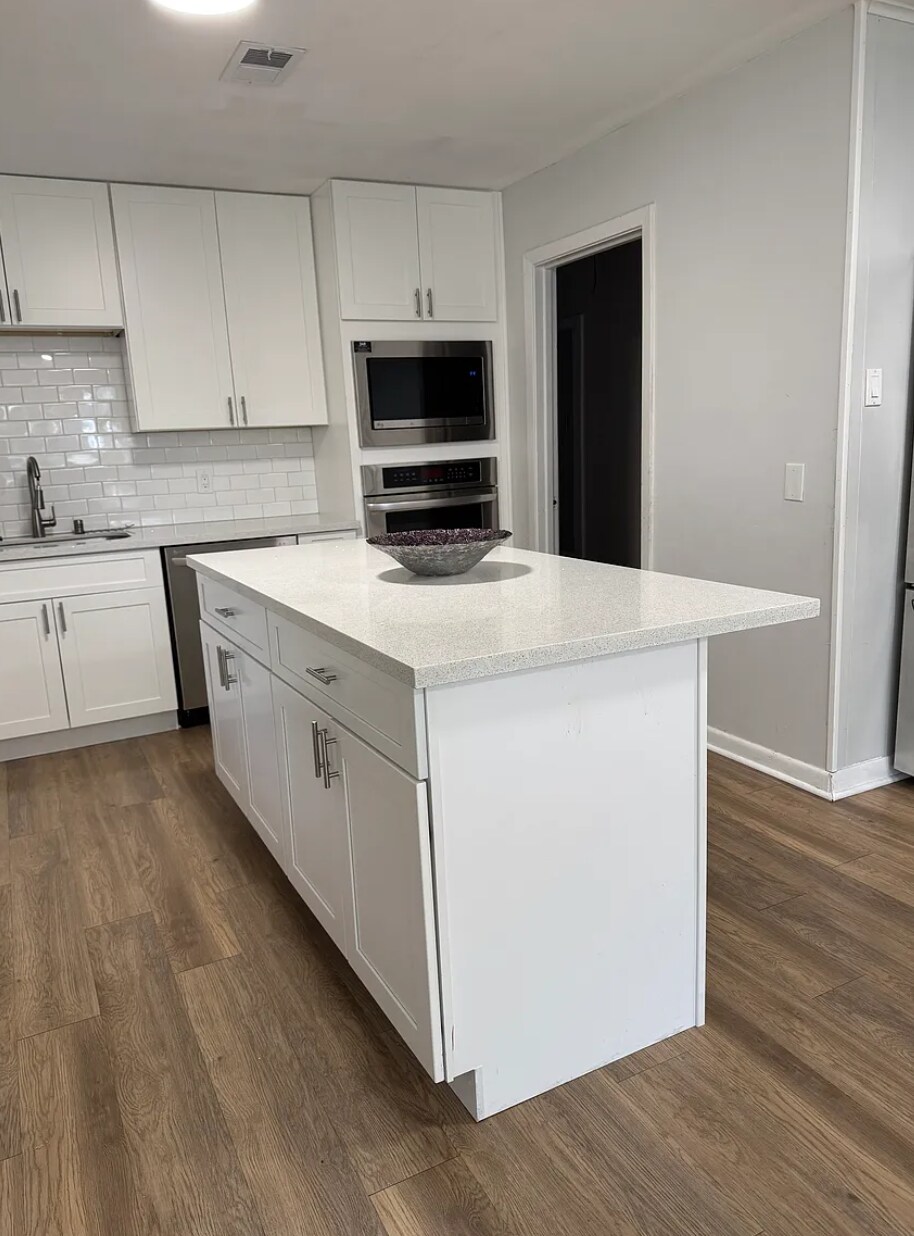 Bar height island. - 3806 Tilson Ln