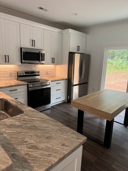 Building Photo - 100 Plum Ct