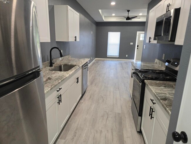 Building Photo - 409 S Steen Dr