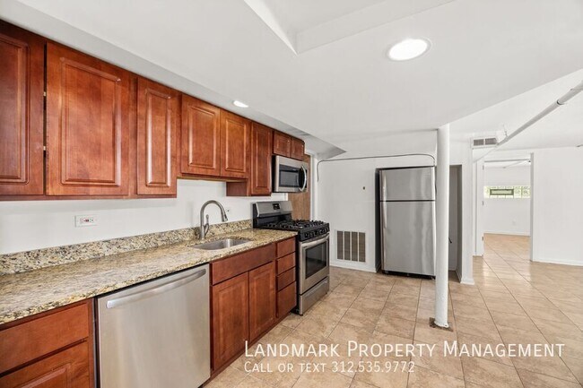 Building Photo - 4144 N Mozart-Garden unit