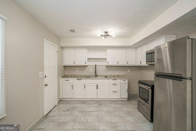 Building Photo - 9285 Cedar Ridge Dr NW