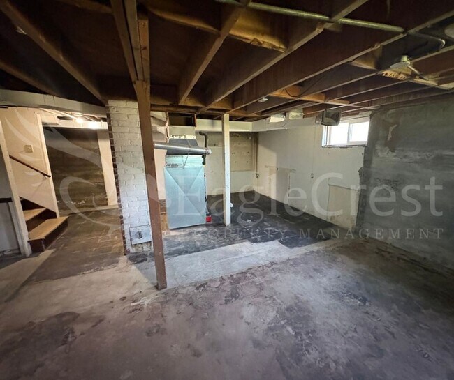 Building Photo - Three Bedroom, Two Bathroom House with Fenced Yard and Outdoor Fireplace