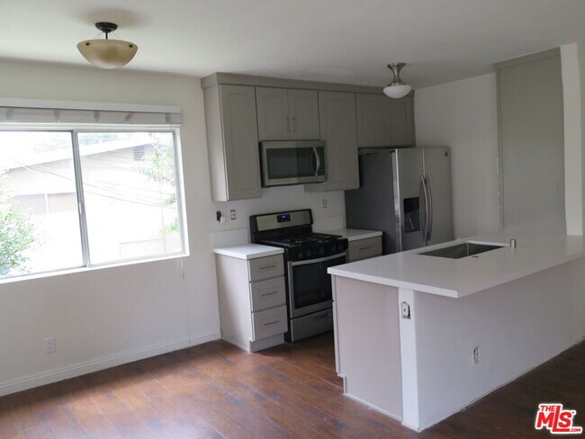 Building Photo - 12492 Gilmore Ave