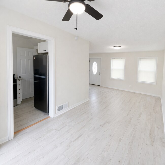 Building Photo - Renovated Home with Modern Kitchen, Basement & Natural Light