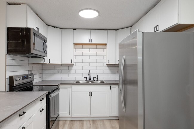 Building Photo - Remodeled 3 Bedroom 2 Bathroom Home, yard, carport