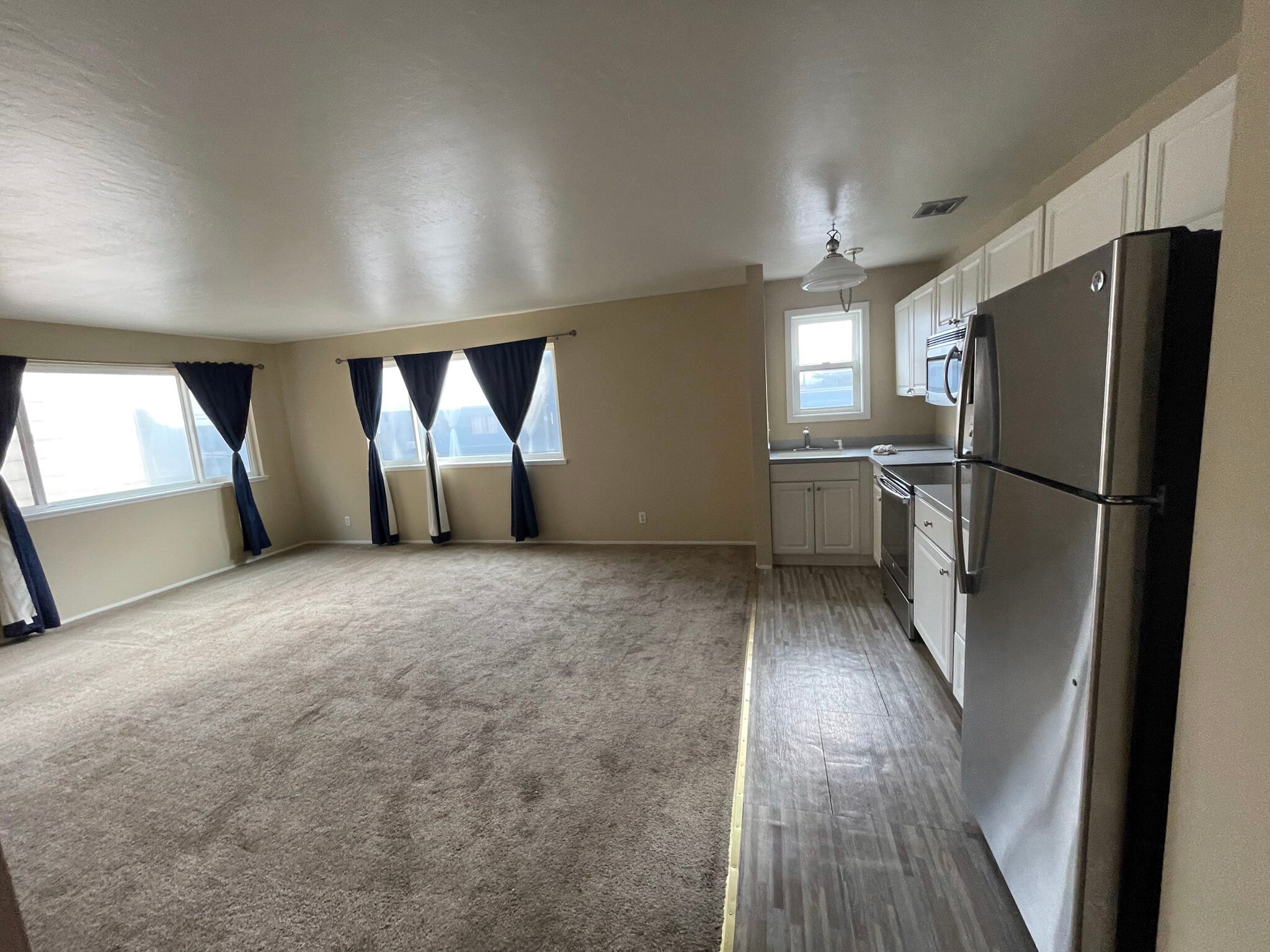 Living room and kitchen - 1220 La Playa St