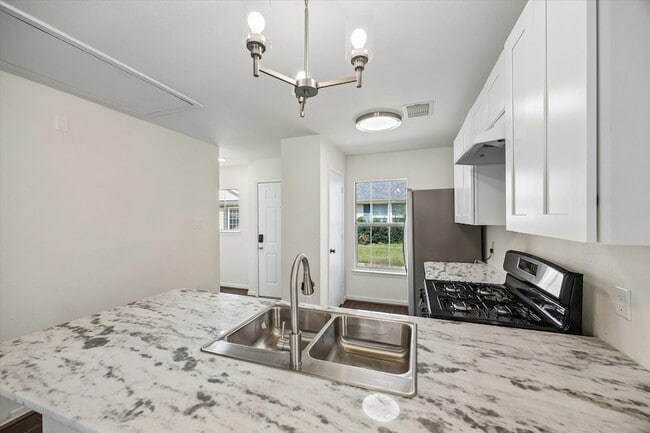 Building Photo - 6106 Settlers Lake Cir E