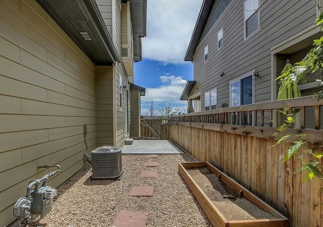 Building Photo - 8381 E 33rd Ave