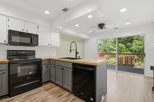 Building Photo - Unbeatable Value! Beautifully Updated 2BR/1.5BA Top-Floor Oasis in the Heart of Olney – Literally...