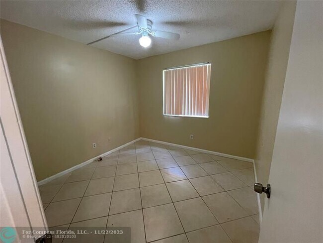 Building Photo - 12222 Royal Palm Blvd