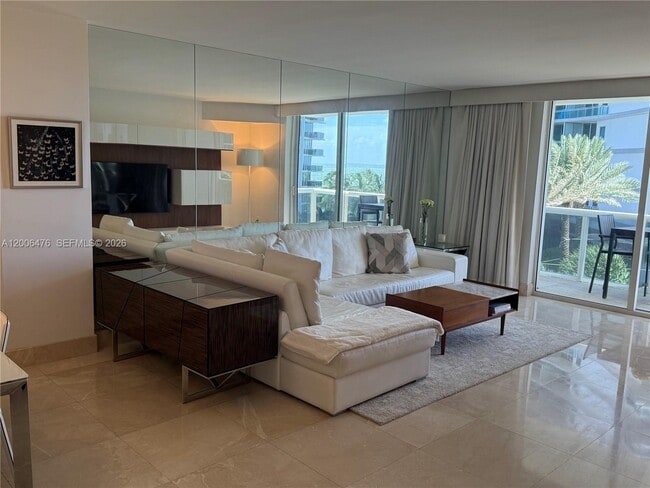 Building Photo - 10275 Collins Ave