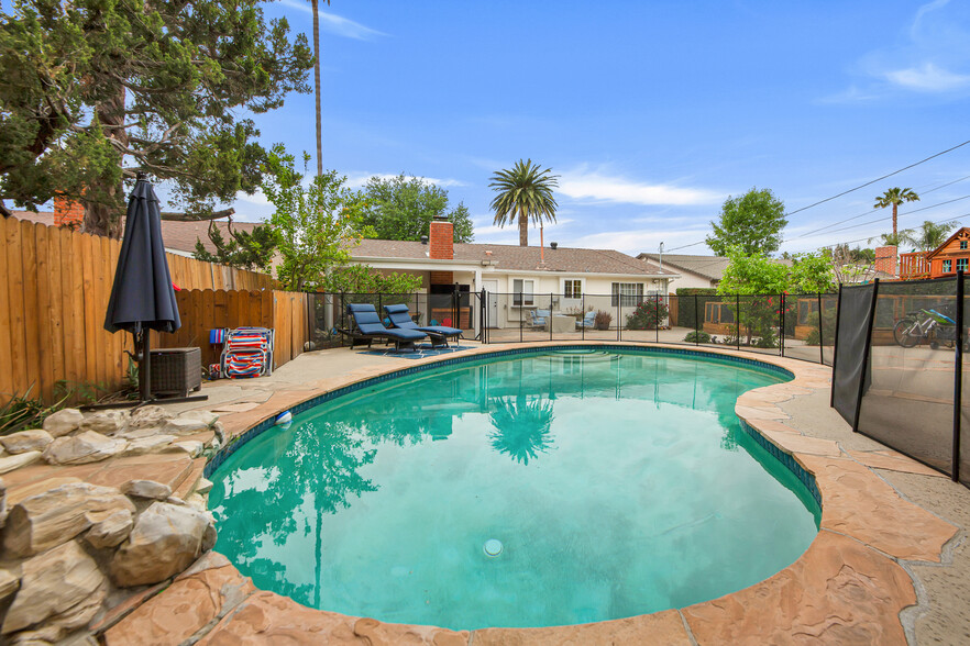 Sparkling blue fenced pool! - 6908 Royer Ave