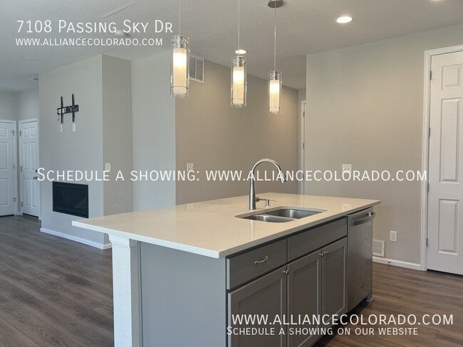 Building Photo - 7108 Passing Sky Dr