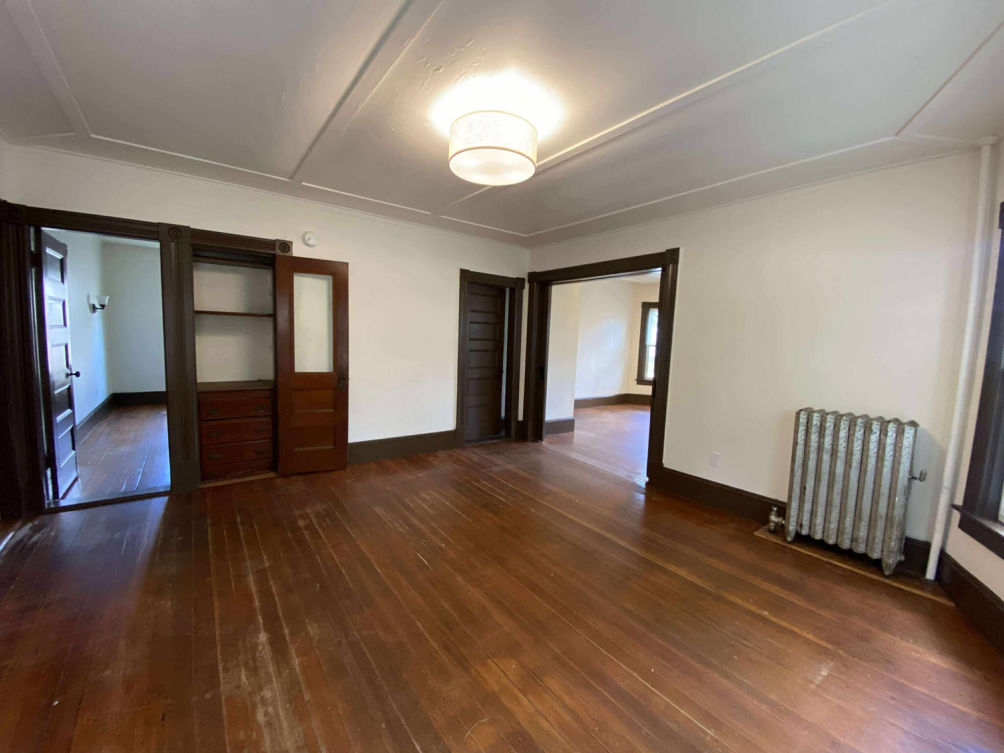 living room into bedroom 1 and bedroom 2. - 66 Franklin St