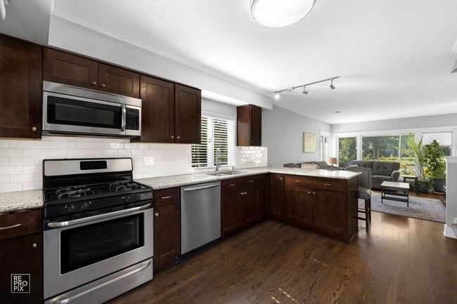 Building Photo - Elmhurst Three Bedroom Home with Fenced Yard and Detached Garage