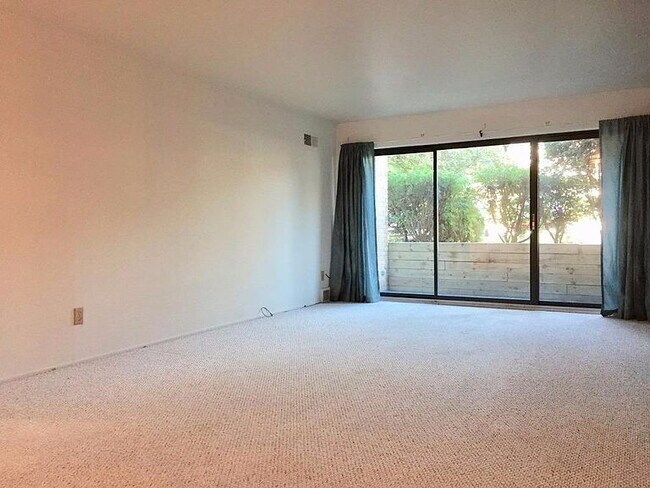 Building Photo - "Glamorous 2-Bedroom Condo with Fireplace ...