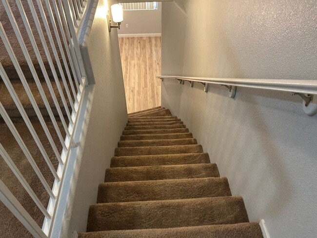 Building Photo - 3 Bedrooms 2.5 Bathrooms 2 car attached garage Gated Subdivision