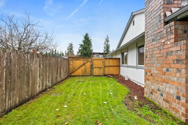 Building Photo - Charming Tacoma Home with A/C, RV Parking, Workshop & Skylit Living Room