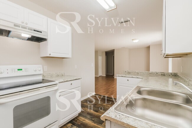 Building Photo - This charming home is ready for your personal touch!