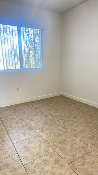 Building Photo - 7845 W 5th Ct