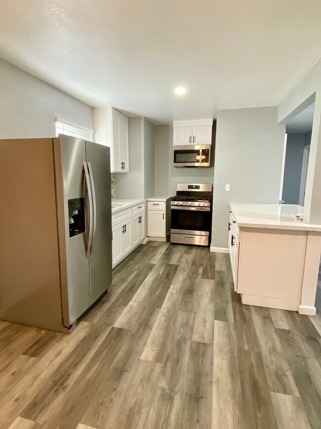 Building Photo - Beautifully Renovated 2BD/1BA Home with Ad...