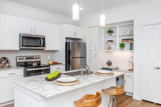 Building Photo - Modern Luxury, Exceptional Offers – Ask Ab...