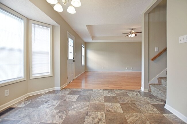 Building Photo - Pet Friendly Three Bedroom with Bonus!